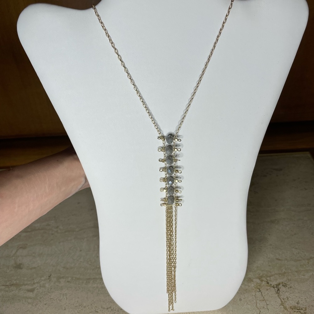 Long gold and stone necklace